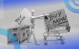 A mannequin pushes a mini shopping cart with a sign saying “buy now” in it. Behind it, dollar bills are labeled “pay later.” /fintech/bnpl-buy-now-pay-later-regulations