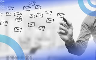 A person uses a marker to draw a wave of emails