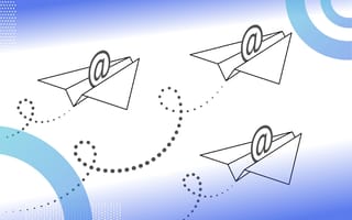A number of paper planes (like the common ‘send email’ symbol) with @ symbols fly through the frame. /sales/forwardable-emails