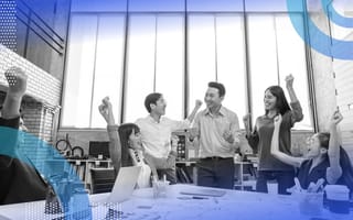 A group of employees celebrate together
