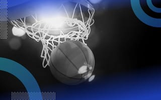 A basketball falls through the hoop