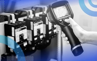 A technician points a thermal imaging camera at some equipment. /artificial-intelligence/ai-reduce-energy-waste-manufacturing