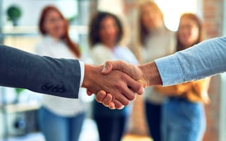 Close up of two businessmen shaking hands