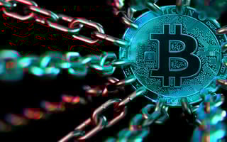 A physical crypto coin tethered by chains as cryptocurrency regulations tighten across the U.S.