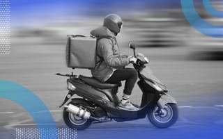 A person rides a scooter, delivering food. /mobile-technology/apps-for-gig-drivers