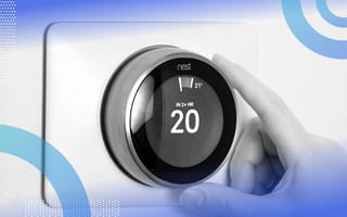 A hand adjusts a smart thermostat to 20 degrees. /design-ux/design-problems-precision