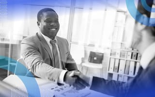 5 Important Things to Consider When Interviewing With a Startup An interviewee shakes hands with the interviewer across a desk