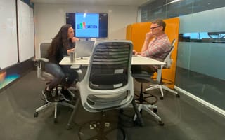 Two people having a meeting in the Ellevation Education office