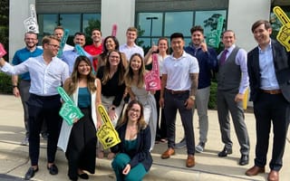 Zscaler group photo with some team members wearing #1 foam fingers
