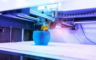 round object being 3D printed by a machine