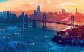 The San Francisco skyline with the backdrop of a colorful sky.