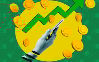 A person watching their crypto rewards grow on their mobile device after staking crypto.