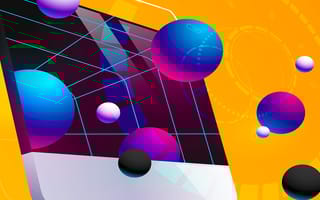 Spheres emerging from a desktop computer screen as a design system comes to life.