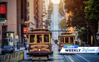 A San Francisco cable car going up a hill.