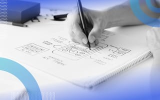 A hand draws a product design
