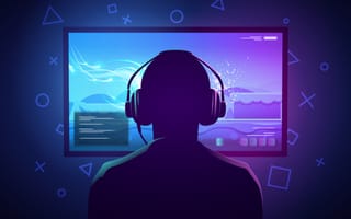 back-of-head shot of person wearing headphones and playing video games