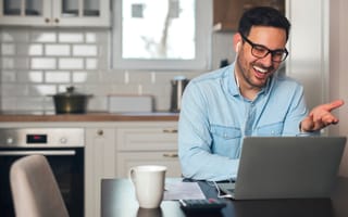 man on a work video call from home