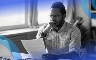 A man studies an investors' rights agreement.