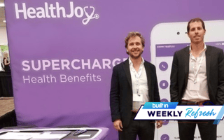 HealthJoy founders are pictured at a conference.