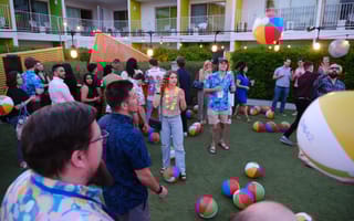 The DAS42 team celebrates in matching Hawaiian shirts