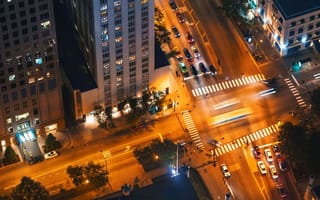 Aerial view of a Chicago street intersection at night.
