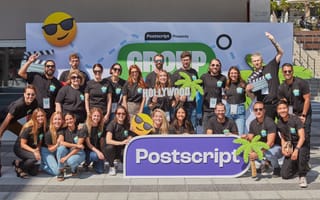 Postscript's team posing with their logo and several large sunglass emojis.