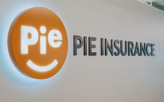 logo and company sign of pie insurance, with white letters in an orange circle