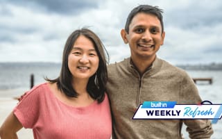 Momento co-founders stand for a photo by the beach.