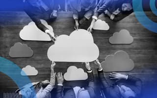 Employees holding a cloud representing cloud skills