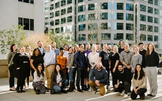 The Sendle team poses for a photo outside the company's office