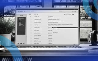 An email client is open on a laptop