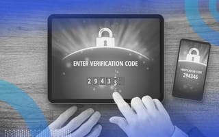 A user types an authentication code into a tabled from a phone