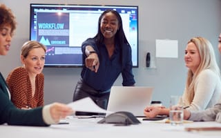 Woman leading a meeting.