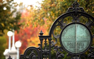 The entrance gate to Boston Public Garden with the official seal of Boston