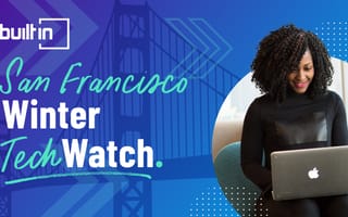 A woman on her laptop browsing Built In SF's list of Winter Tech Watch companies.