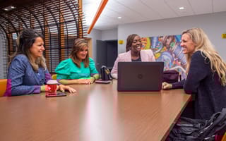 General Motors team members in the office