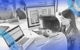 Laravel people working viewing monitor