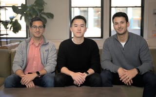 Oyster co-founders sitting on a couch.