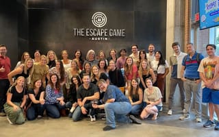 khoros company group photo at an escape room game location