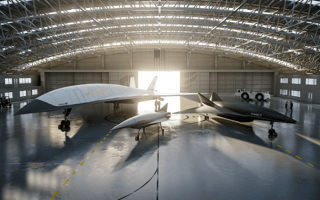 An image of Quarterhorse, Darkhorse and Halcyon in a hangar.