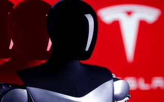A headshot of the Tesla Robot Optimus.