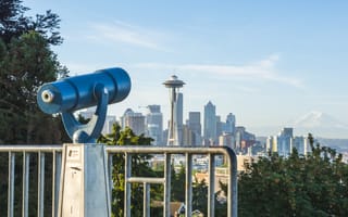 A telescope facing the Seattle skyline.
