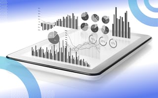 Data visualization conceptual image of a tablet with 3D graphs and charts hovering above it