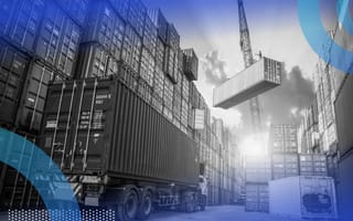 Crane lifting a shipping container symbolizing containerization