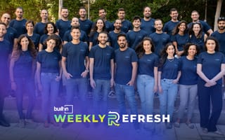 A group photo of the PayEm team outside.