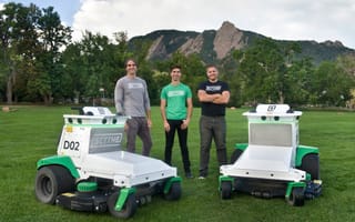 Scythe Robotics founders and the M.52 mower.