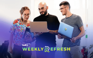 Sendinblue team members work together in front of laptops