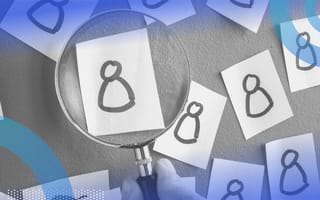 talent acquisition image of cartoon busts of people on a bulletin board. A magnifying glass hovers over one of the images.