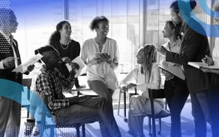 Talent strategy image of a large group of young people talking and laughing together in a collaborative atmosphere
