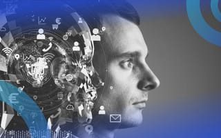 A robotic head next to a human face